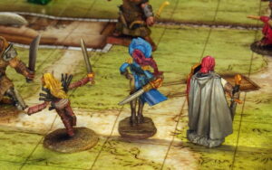 Mariel Twinspar, Isabeau Laroche (peinte pour représenter Reya Mantlemorn) et Merisiel de dos